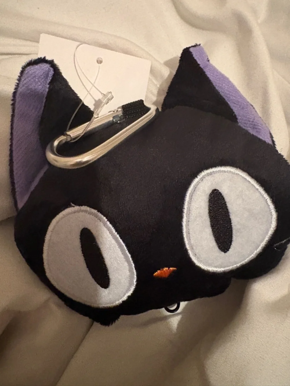 Black Plush coin purse in image of choco cat -holds reusable shopping bag